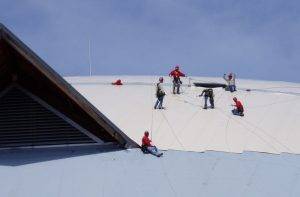 D. C. Taylor Co. reroofing a dome-shaped building